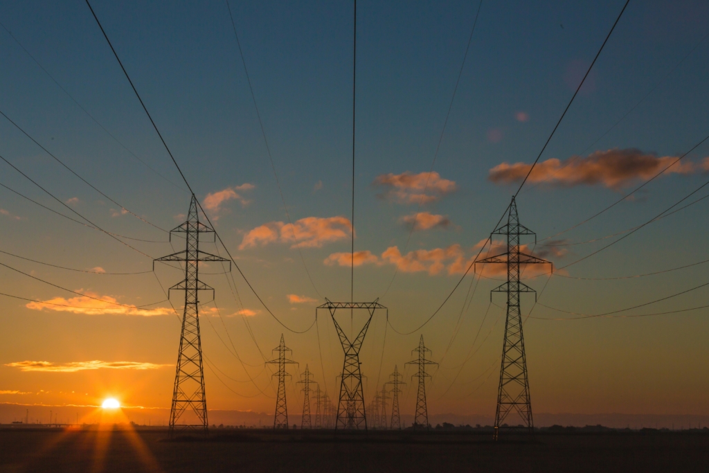 Powerline towers at sunset